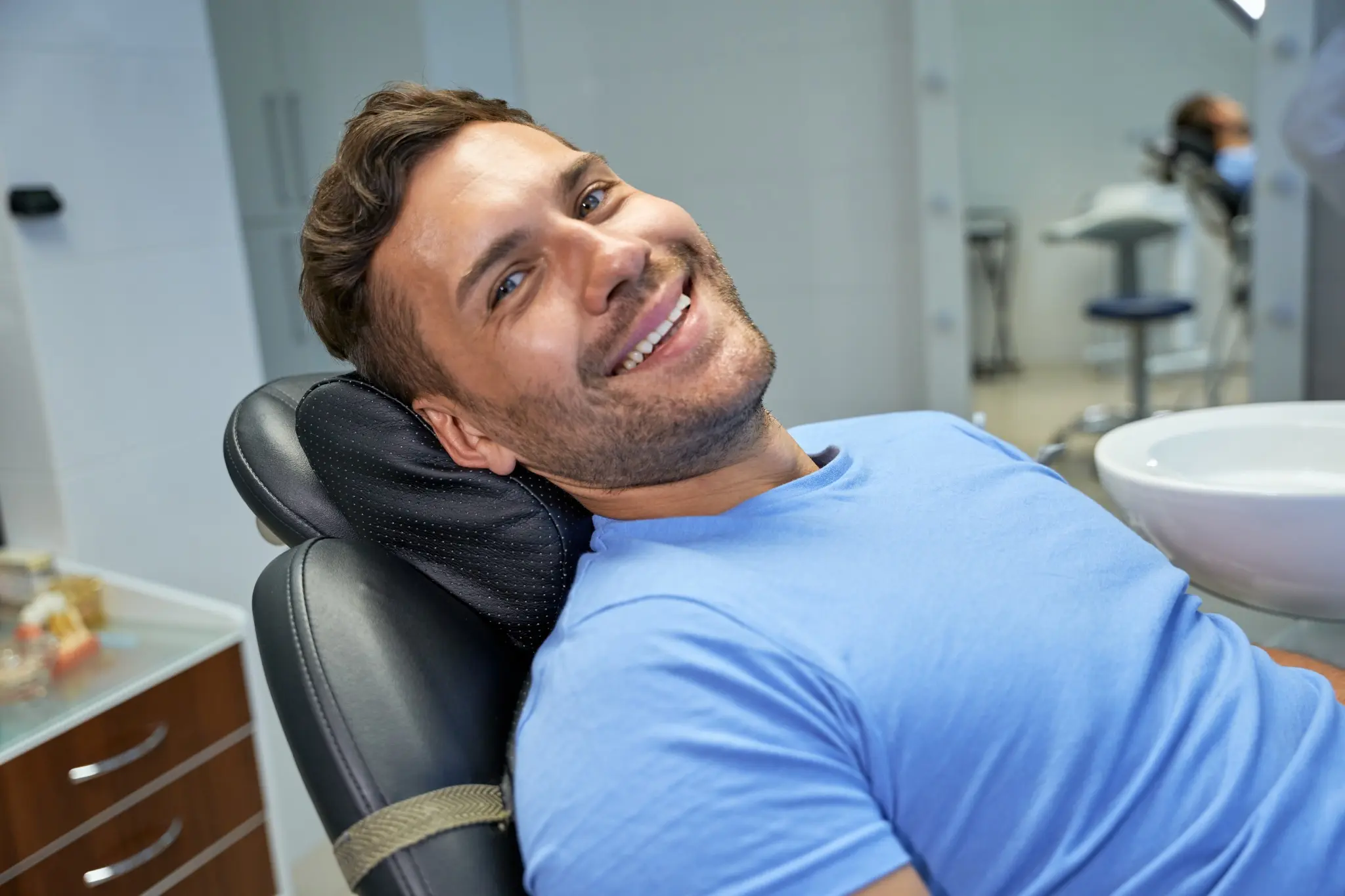 Smiling patient receiving urgent dental treatment at Tudor House Dental, Chester