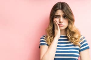 toothache pain, see an emergency dentist